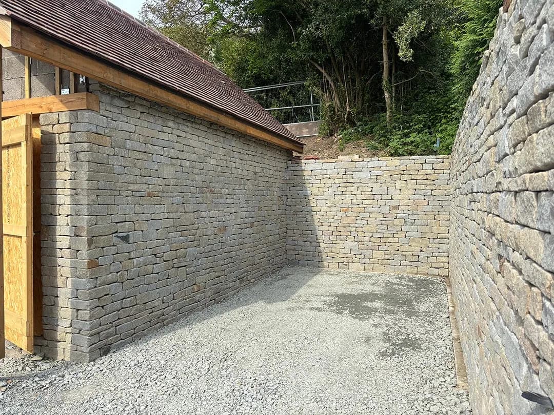 Stone walls either side of a gravel drive, Malvern